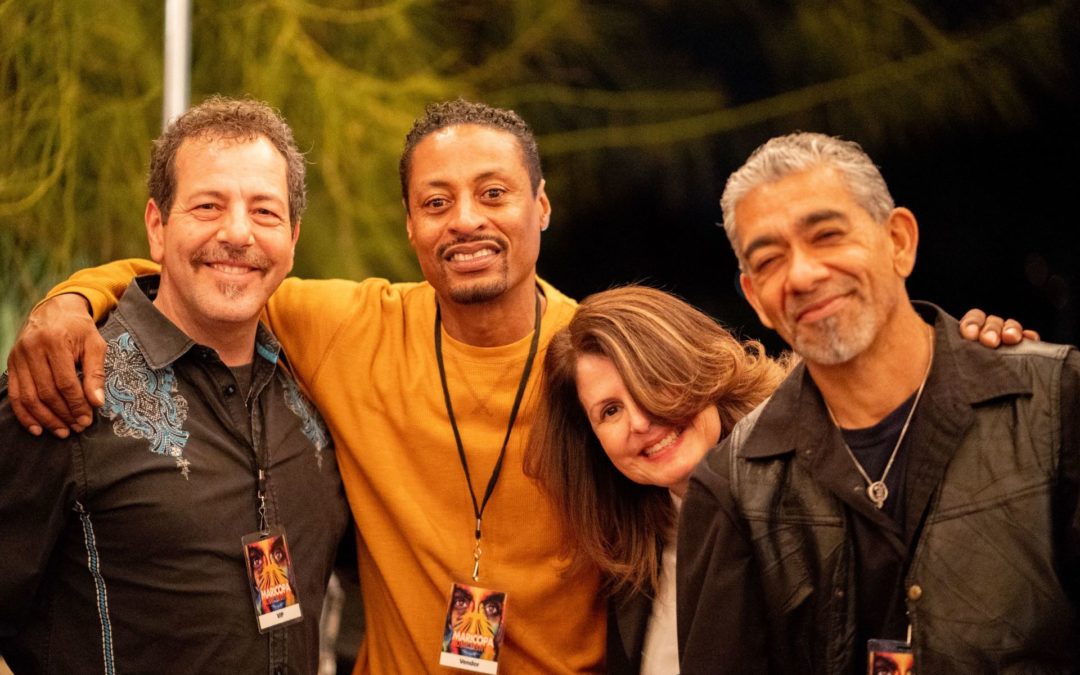 A group of people posing for the camera.